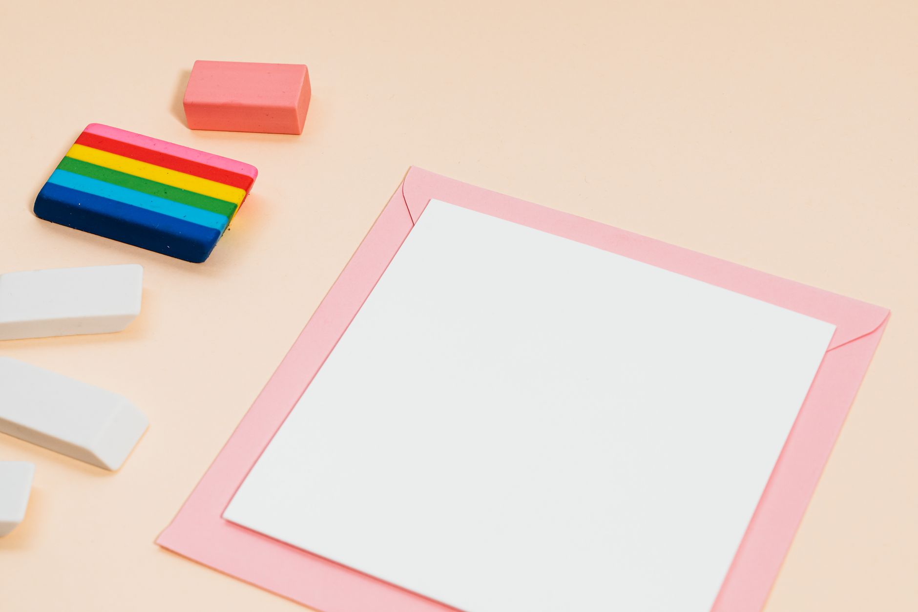 Colorful collection of Japanese erasers in a flat lay arrangement on a pastel background