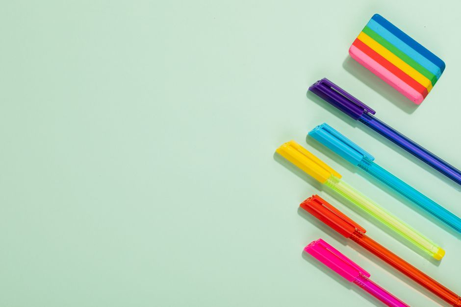 Collection of colorful gel pens on white