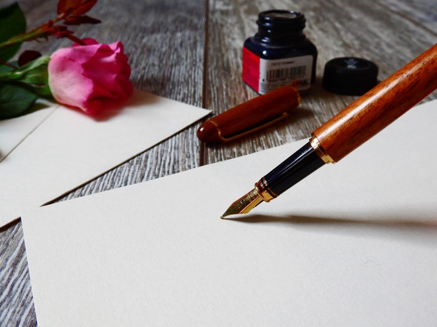 Vintage fountain pen writing on paper