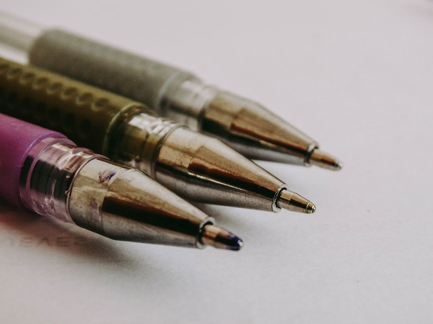 Ballpoint pen writing on notebook